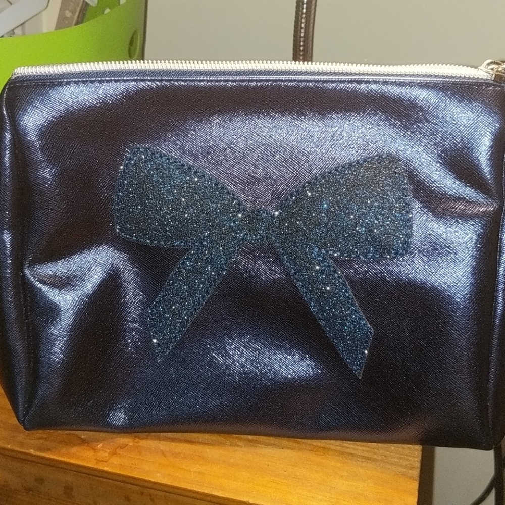 Clutch with glitter bow